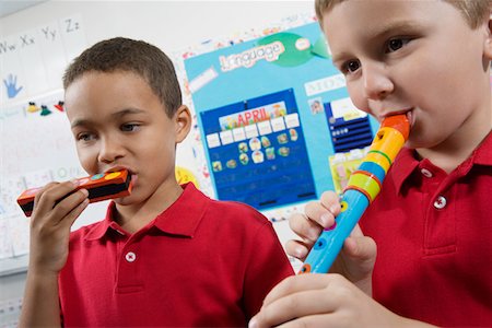 recorder (musical instrument) - Elementary Students in Music Class Stock Photo - Premium Royalty-Free, Code: 693-06020703