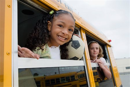 Elementary Students on School Bus Stock Photo - Premium Royalty-Free, Code: 693-06020809