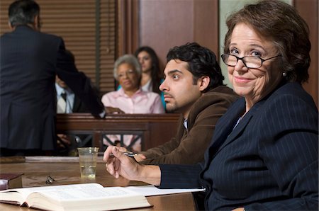 Defense lawyer with client in court Stock Photo - Premium Royalty-Free, Code: 693-06020921