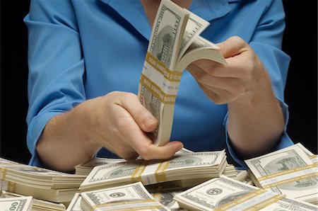 simsearch:693-06021323,k - Woman Counting Money Stock Photo - Premium Royalty-Free, Code: 693-06021350