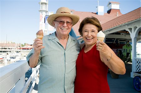 enjoy ice cream - Senior couple holding ice creams Stock Photo - Premium Royalty-Free, Code: 693-06021684
