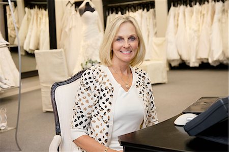 simsearch:693-05794538,k - Portrait of a happy senior woman sitting in bridal store Stock Photo - Premium Royalty-Free, Code: 693-06121259