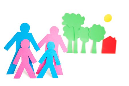 studio creative group - Conceptual image of paper cut out shapes representing a family with trees and house over white background Stock Photo - Premium Royalty-Free, Code: 693-06324327