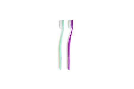 Two toothbrushes over white background Stock Photo - Premium Royalty-Free, Code: 693-06324350