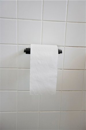 Close-up view of toilet paper in bathroom Stock Photo - Premium Royalty-Free, Code: 693-06325172