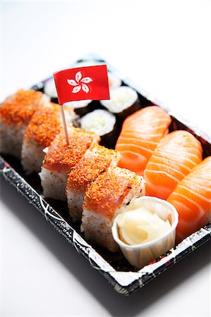 Sushi food on tray with Hong Kong flag against white background Stock Photo - Premium Royalty-Free, Code: 693-06403356