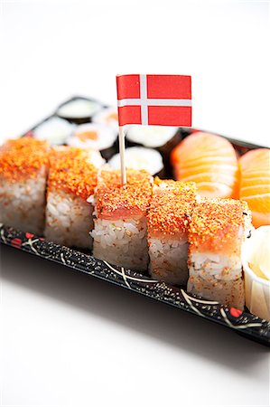 Sushi food on tray with Danish flag against white background Stock Photo - Premium Royalty-Free, Code: 693-06403358