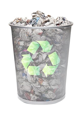 Recycling bin full of crumpled papers over white background Stock Photo - Premium Royalty-Free, Code: 693-06403384