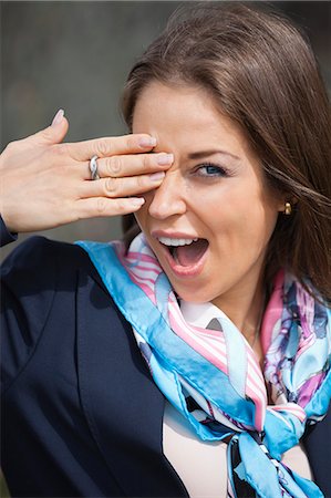 Portrait of young businesswoman yawning Stock Photo - Premium Royalty-Free, Code: 693-06403506