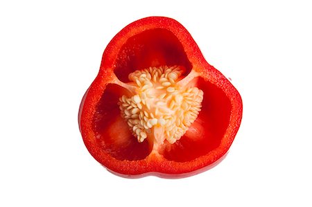 pepper (vegetable) - Close-up of cross section of red bell pepper Stock Photo - Premium Royalty-Free, Code: 693-06497596