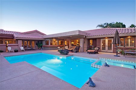 simsearch:693-06667917,k - Rear view of luxury villa with swimming pool Stock Photo - Premium Royalty-Free, Code: 693-06667917