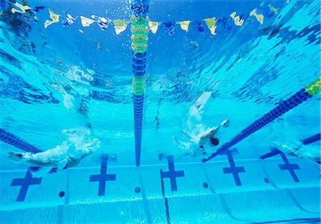 swimming pool water - Underwater view of professional participants racing in pool Stock Photo - Premium Royalty-Free, Code: 693-06668086