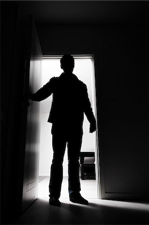 dark - Full-length of thief entering into house Stock Photo - Premium Royalty-Free, Code: 693-07444429