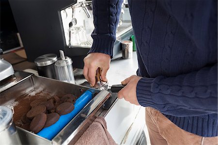 Midsection of man preparing coffee at mobile coffee shop Stock Photo - Premium Royalty-Free, Code: 693-07455838