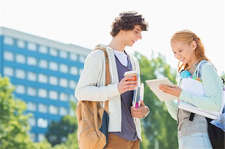simsearch:614-07031973,k - Male and female students using digital tablet at college campus Stock Photo - Premium Royalty-Free, Code: 693-07912200