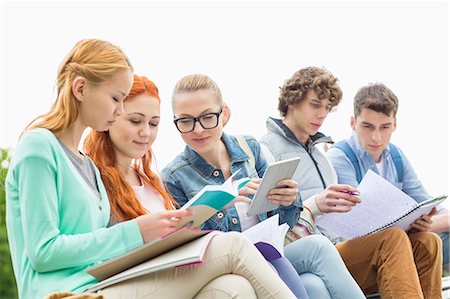 simsearch:614-07031973,k - University students studying together in park Stock Photo - Premium Royalty-Free, Code: 693-07912239