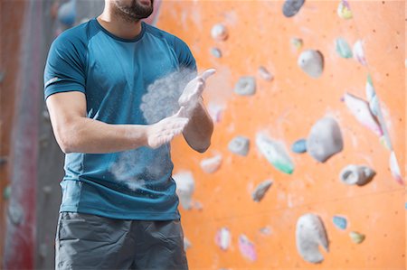 simsearch:693-08126938,k - Midsection of man dusting powder by climbing wall in crossfit gym Stock Photo - Premium Royalty-Free, Code: 693-08126914