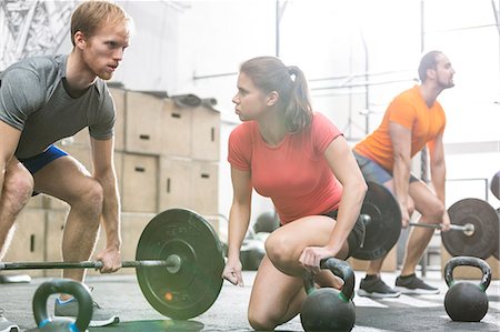 simsearch:693-08126938,k - People weightlifting in crossfit gym Stock Photo - Premium Royalty-Free, Code: 693-08126927