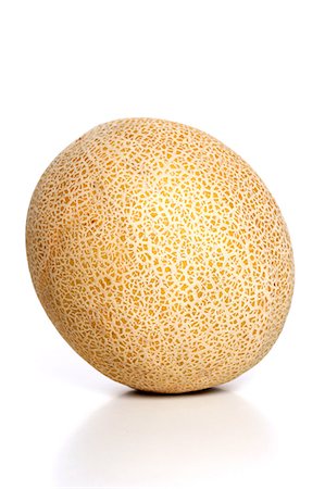 Melon on white background - close-up Stock Photo - Premium Royalty-Free, Code: 693-08127374