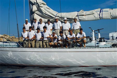 simsearch:693-03314237,k - Sailing crew posing for a group portrait on board yacht Stock Photo - Premium Royalty-Free, Code: 693-03299364