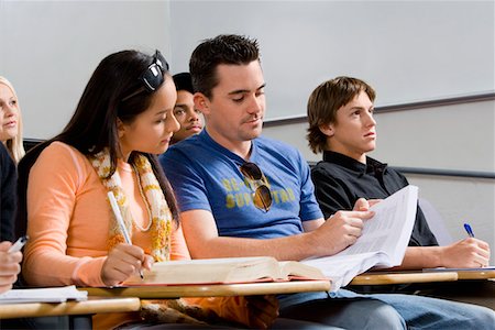 Students studying in class Stock Photo - Premium Royalty-Free, Code: 693-03299765