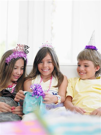 simsearch:693-03305634,k - Children (7-12) at birthday party, smiling Stock Photo - Premium Royalty-Free, Code: 693-03305654