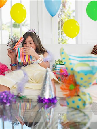 simsearch:693-03305634,k - Young girl (7-9) opening birthday presents Stock Photo - Premium Royalty-Free, Code: 693-03305661