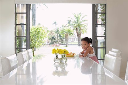 french door - Girl (5-6 years) sitting at dining table Stock Photo - Premium Royalty-Free, Code: 693-03305700