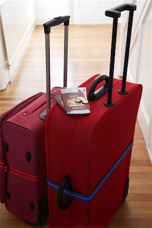 Two suitcases standing in hallway, elevated view Stock Photo - Premium Royalty-Free, Code: 693-03307074