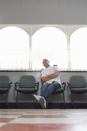 Barber sitting in barber shop, portrait Stock Photo - Premium Royalty-Free, Code: 693-03307155