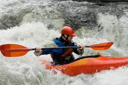 rapids - Man kayaking in river Stock Photo - Premium Royalty-Free, Code: 693-03308489