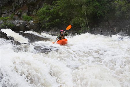 rapids - Man kayaking in river Stock Photo - Premium Royalty-Free, Code: 693-03308528