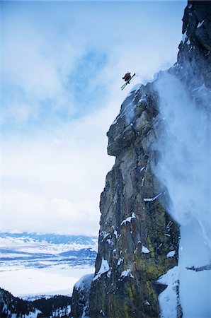 extreme skiing cliff - Skier jumping from cliff in mountains Stock Photo - Premium Royalty-Free, Code: 693-03302483