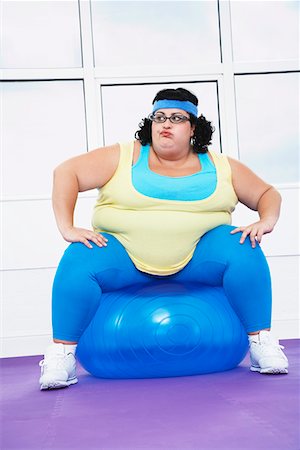 fat lady sitting - Overweight Woman Sitting on Exercise Ball Stock Photo - Premium Royalty-Free, Code: 693-03302946