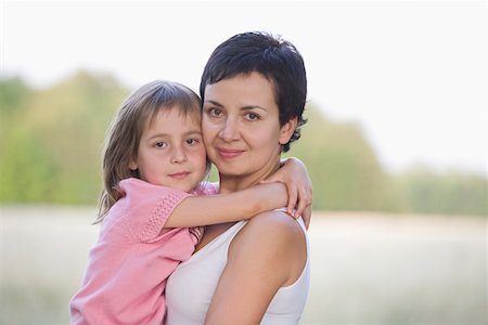 Mother and Daughter in a Field Stock Photo - Premium Royalty-Free, Code: 693-03314010