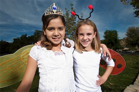 simsearch:614-03469543,k - Portrait of two girls (7-12) wearing costumes Stock Photo - Premium Royalty-Free, Code: 693-03314096