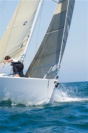 simsearch:693-03314237,k - Crew member on board yacht competing in team sailing event, California Stock Photo - Premium Royalty-Free, Code: 693-03314250