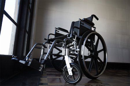 Wheelchair in room Stock Photo - Premium Royalty-Free, Code: 693-03314489