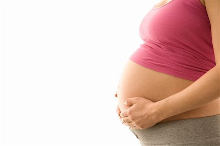 female belly expansion - Pregnant woman, mid section Stock Photo - Premium Royalty-Free, Code: 693-03314535