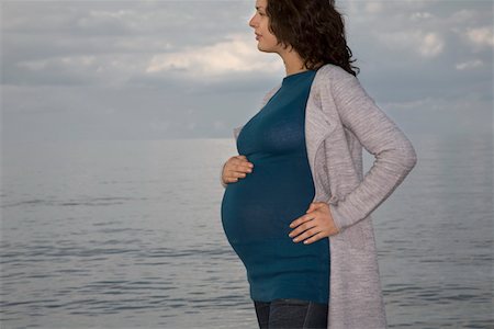 pregnant expanding - Pregnant woman at ocean Stock Photo - Premium Royalty-Free, Code: 693-03314563
