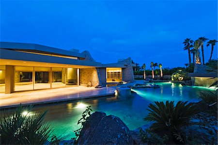 swimming pool night palm tree - House exterior Stock Photo - Premium Royalty-Free, Code: 693-03315988