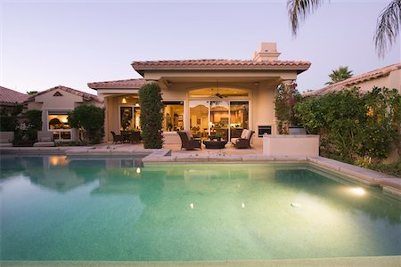 real estate - Palm Springs swimming pool, evening light Stock Photo - Premium Royalty-Free, Code: 693-03317378