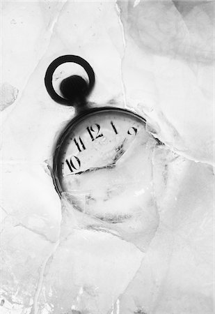 pocket watch - Pocket watch embedded in ice Stock Photo - Premium Royalty-Free, Code: 693-03310911