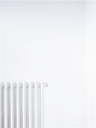 radiator - Radiator against white wall Stock Photo - Premium Royalty-Free, Code: 693-03310981