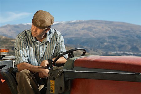 simsearch:693-03312660,k - Farmer on tractor Stock Photo - Premium Royalty-Free, Code: 693-03312658