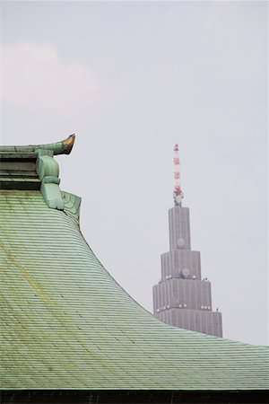 Modern Skyscraper Behind Traditional Roof of Meiji Shrine Stock Photo - Premium Royalty-Free, Code: 693-03313487