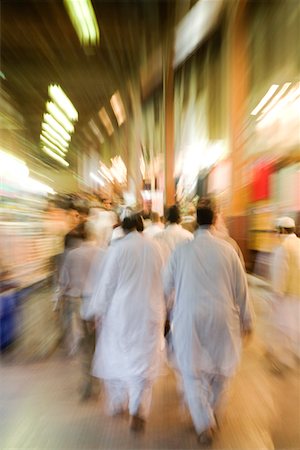 souk - Dubai, UAE, The Bur Dubai souq is crowded with pedestrians just after dark. Stock Photo - Premium Royalty-Free, Code: 693-03313660