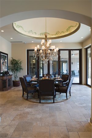 Circular dining room with ceiling detail Stock Photo - Premium Royalty-Free, Code: 693-03474128