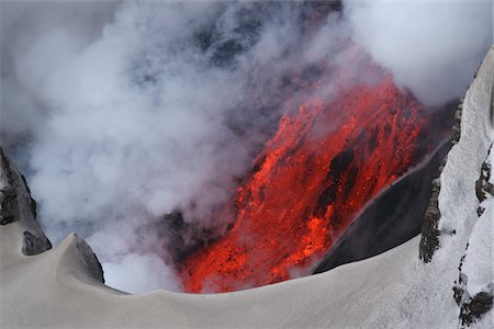 Molten lava flowing from Eyjafjallajokull, Fimmvorduhals, Iceland Stock Photo - Premium Royalty-Free, Code: 693-03474618