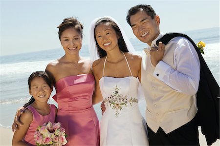 Bride and Groom with bridesmaid and sister, (portrait) Stock Photo - Premium Royalty-Free, Code: 693-03686315